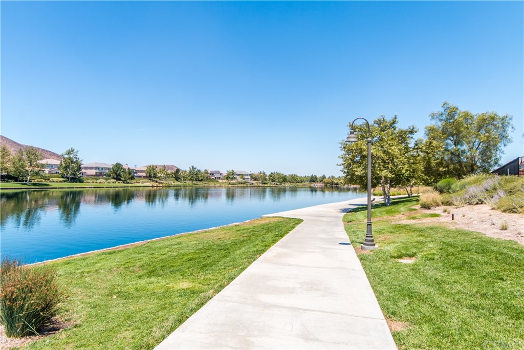 29957 Maritime Way Menifee, CA 92585 - Photo 17 of 25 a view of a lake with a large trees