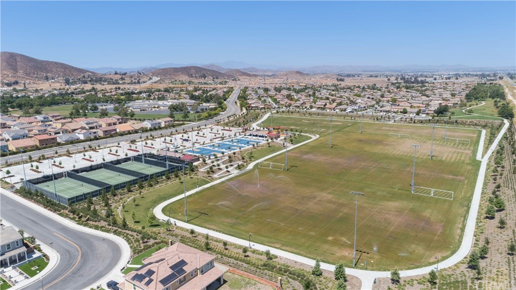 29957 Maritime Way Menifee, CA 92585 - Photo 23 of 25 a view of a swimming pool with a balcony