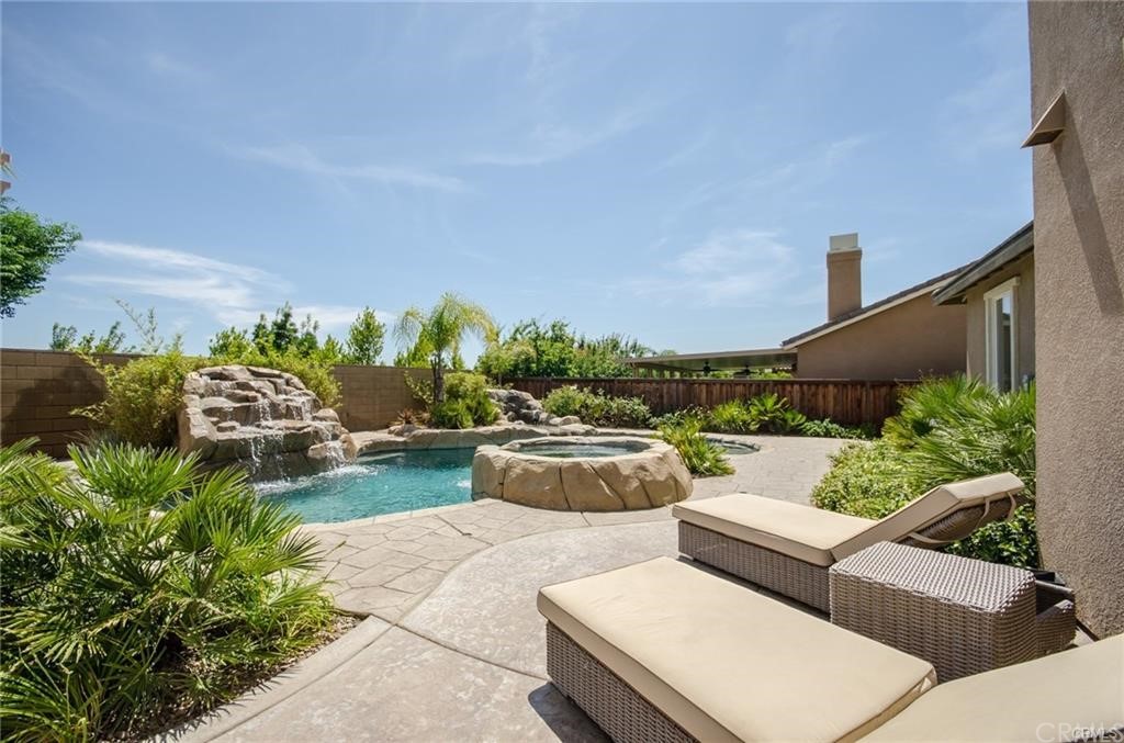 29957 Maritime Way Menifee, CA 92585 - Photo 4 of 25 a view of a patio with couches and potted plants