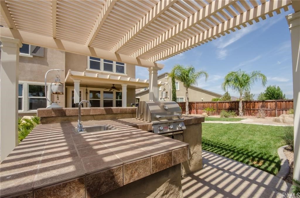 29957 Maritime Way Menifee, CA 92585 - Photo 6 of 25 a view of a house with backyard and sitting area