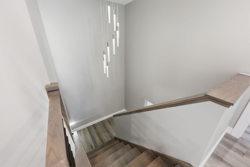 287 Whitney Avenue Holyoke, MA 01040 - Photo 24 of 40 a view of entryway with wooden floor