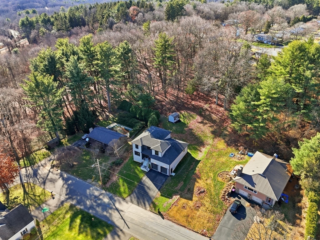 287 Whitney Avenue Holyoke, MA 01040 - Photo 39 of 40 an aerial view of a house with swimming pool and outdoor seating