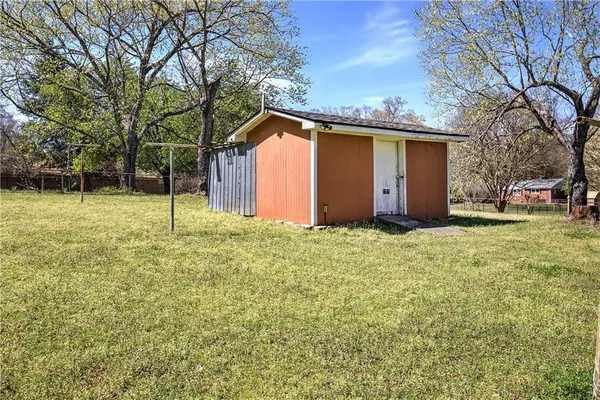 a backyard of a house with lots of green space