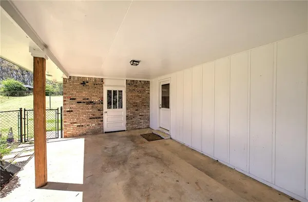 a view of a big room with windows