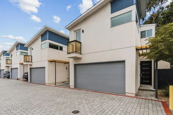 a view of a house with a garage