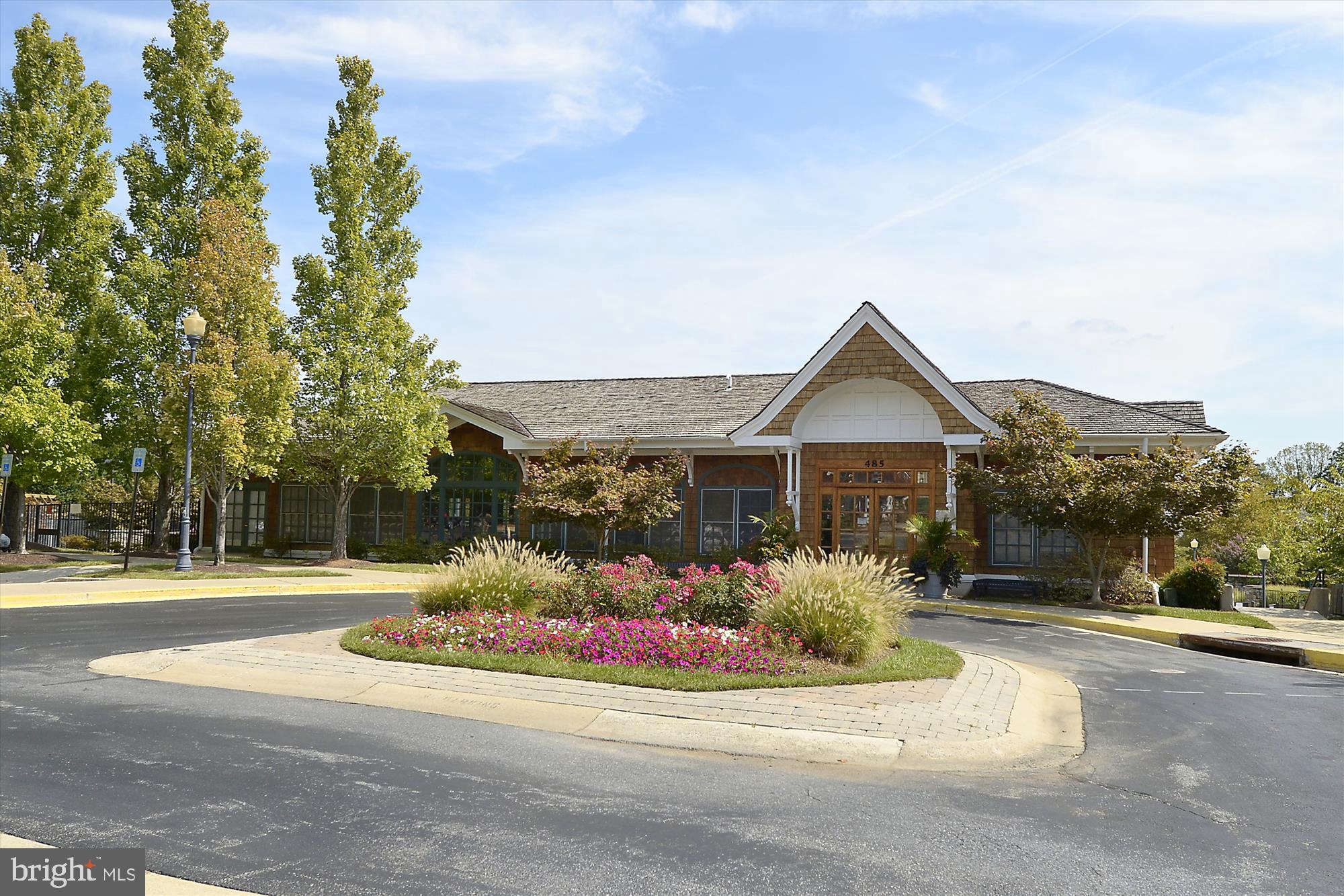 403 Kent Oaks Way Gaithersburg, MD 20878 - Photo 61 of 76 a front view of a house with a yard and garage