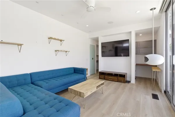 a view of a hallway with washer and dryer