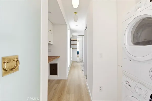 a bathroom with a sink toilet vanity and shower