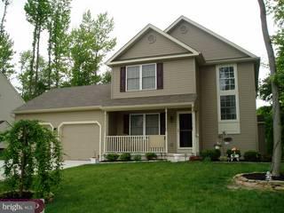 634 Surrey Road Sewell, NJ 08080 - Photo 1 of 4 front view of a house with a yard