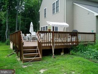 634 Surrey Road Sewell, NJ 08080 - Photo 4 of 4 a view of a deck with a garden