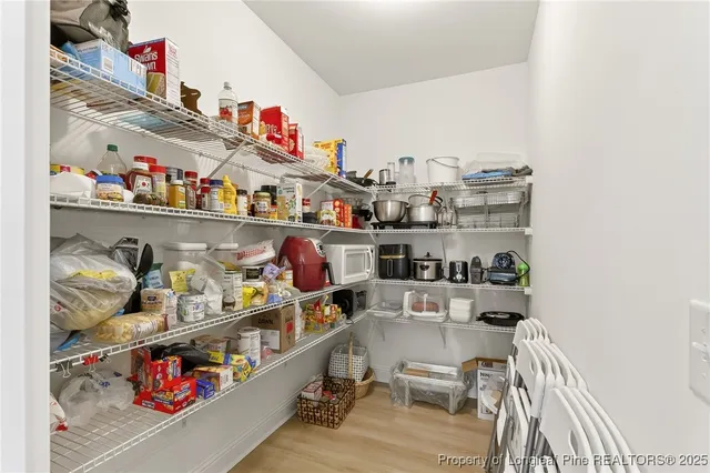 a room with storage and utility