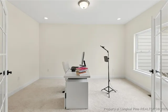 a workspace with furniture and window