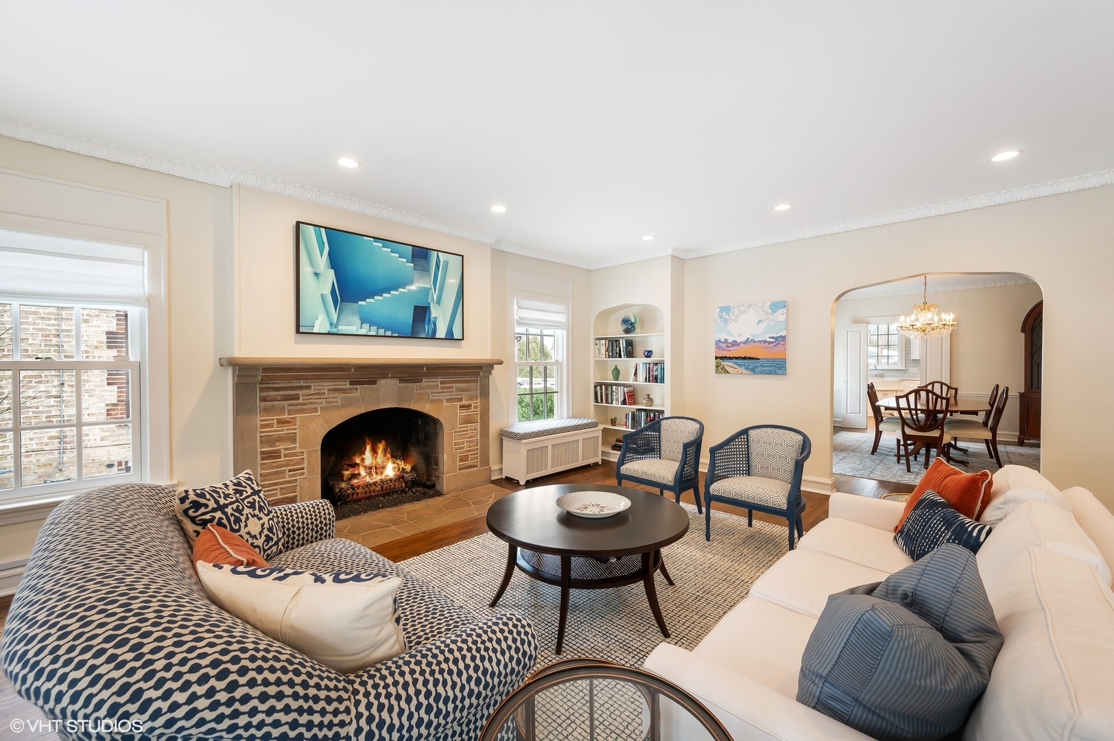 221 Church Road Winnetka, IL 60093 - Photo 11 of 42 a living room with furniture a fireplace and a table