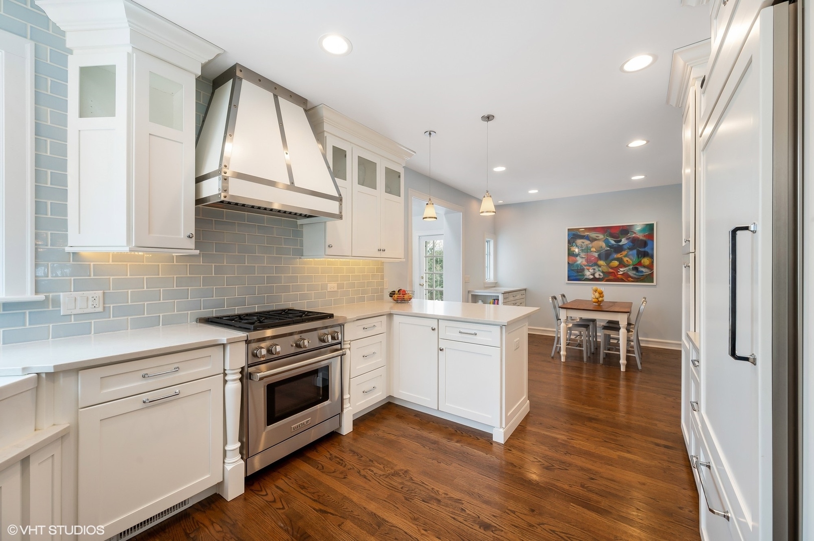 221 Church Road Winnetka, IL 60093 - Photo 15 of 42 a kitchen with a stove a sink and a refrigerator