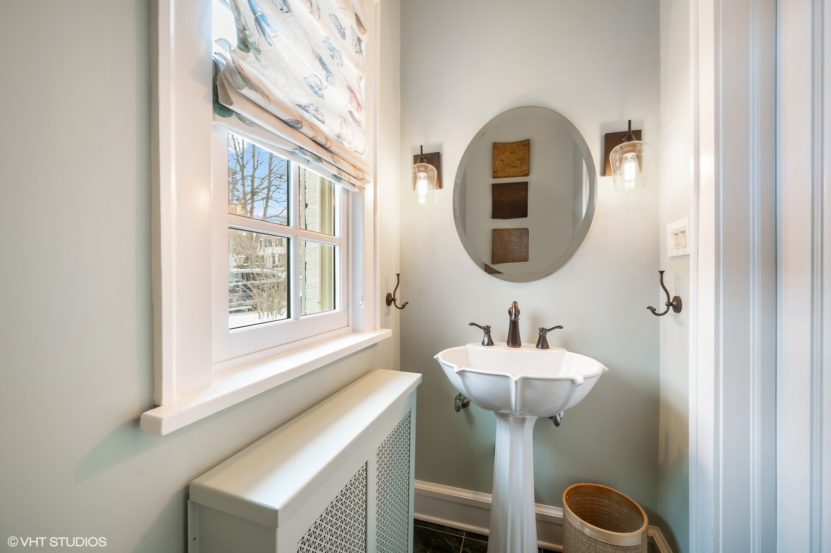 221 Church Road Winnetka, IL 60093 - Photo 22 of 42 a bathroom with a sink and a mirror