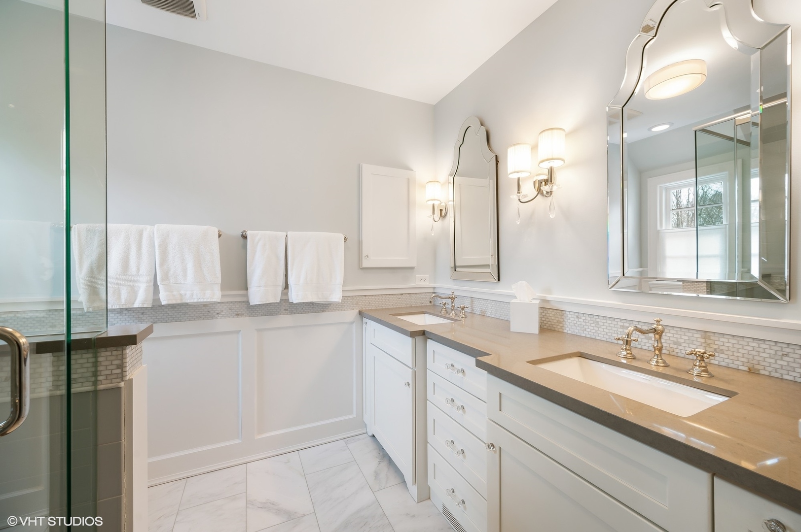 221 Church Road Winnetka, IL 60093 - Photo 25 of 42 a bathroom with a sink and a mirror