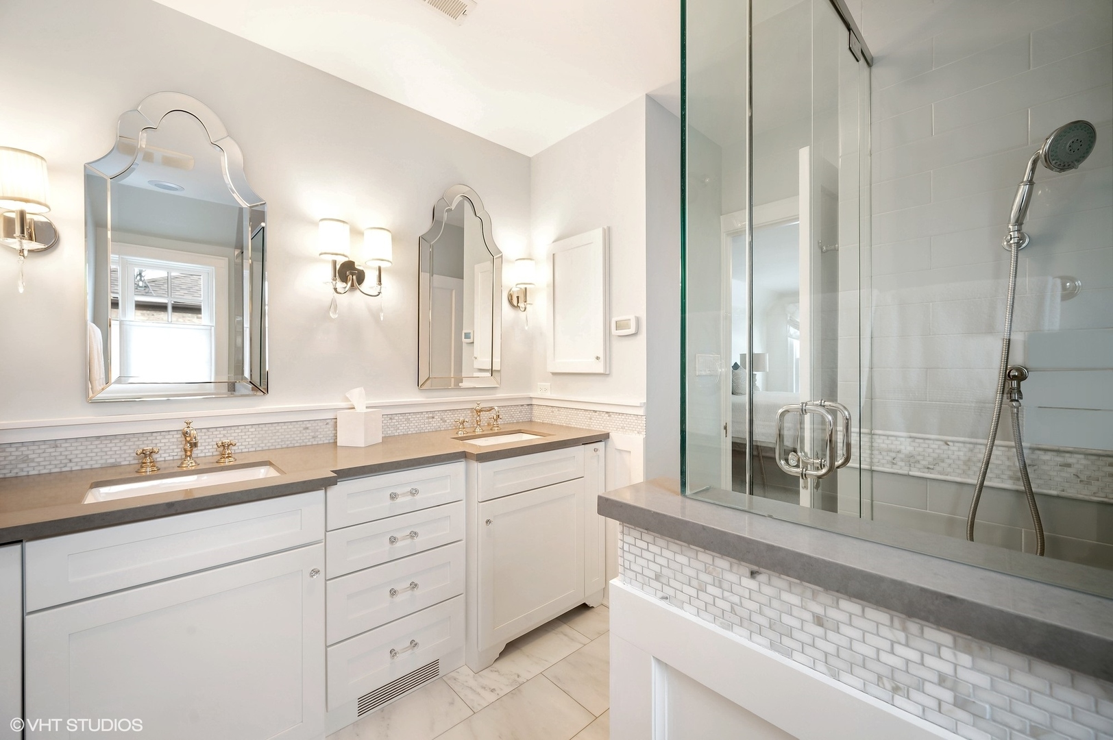 221 Church Road Winnetka, IL 60093 - Photo 26 of 42 a spacious bathroom with double sink and a mirror