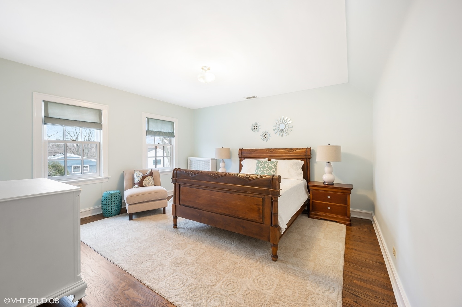 221 Church Road Winnetka, IL 60093 - Photo 27 of 42 a bed room with a bed and a chair