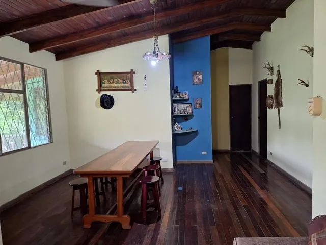 a view of a livingroom with furniture and wooden floor