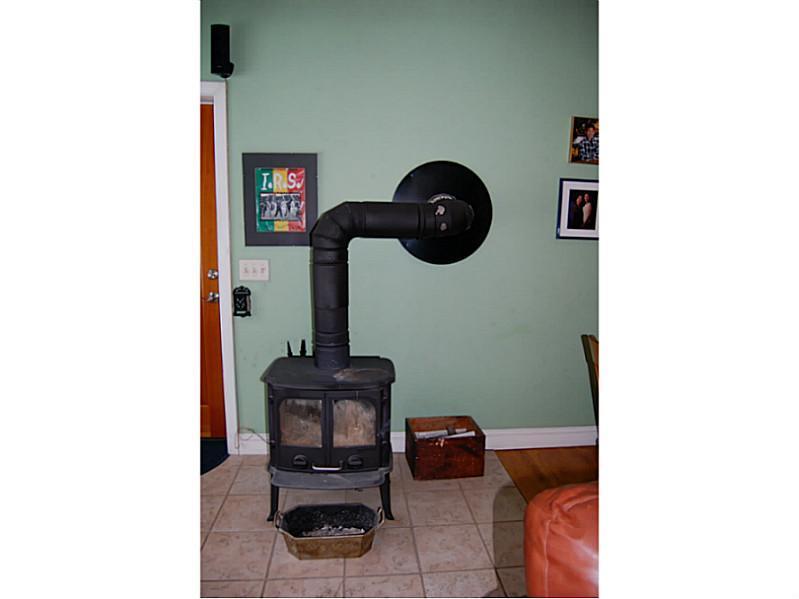 265 Tripp Lake Road Poland, ME 04274 - Photo 10 of 35 Other. Woodstove