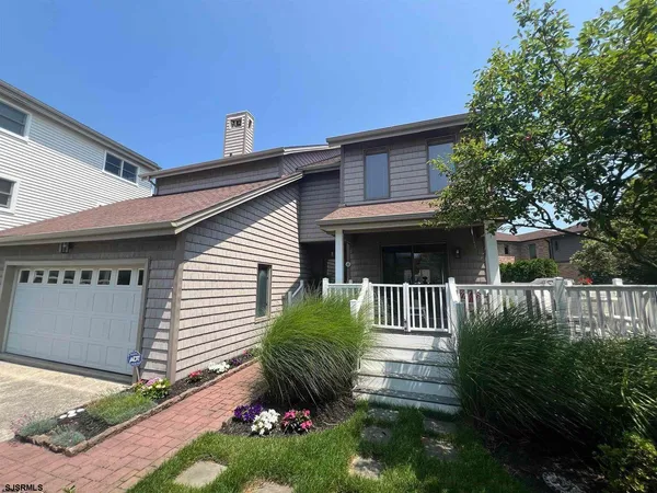 a view of a back yard of the house