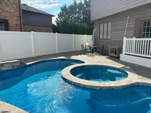 a view of back yard of the house