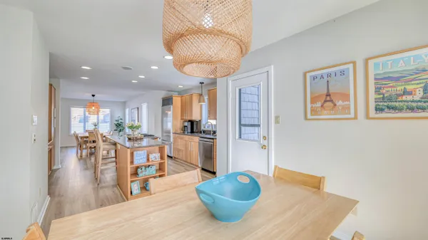 a large kitchen with lots of counter space and windows