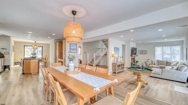 a living room with furniture and a table