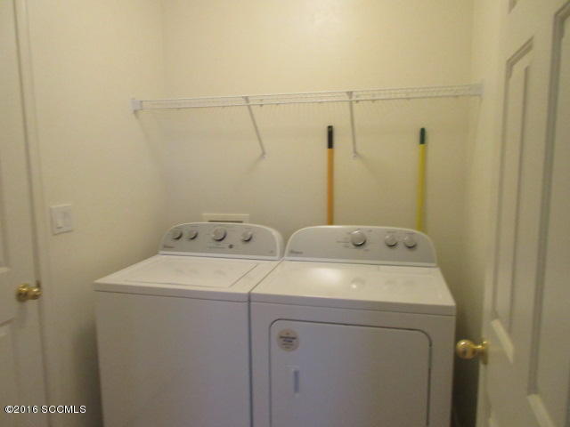 1881 Via Ochoa Rio Rico, AZ 85648 - Photo 44 of 44 a utility room with dryer and washer