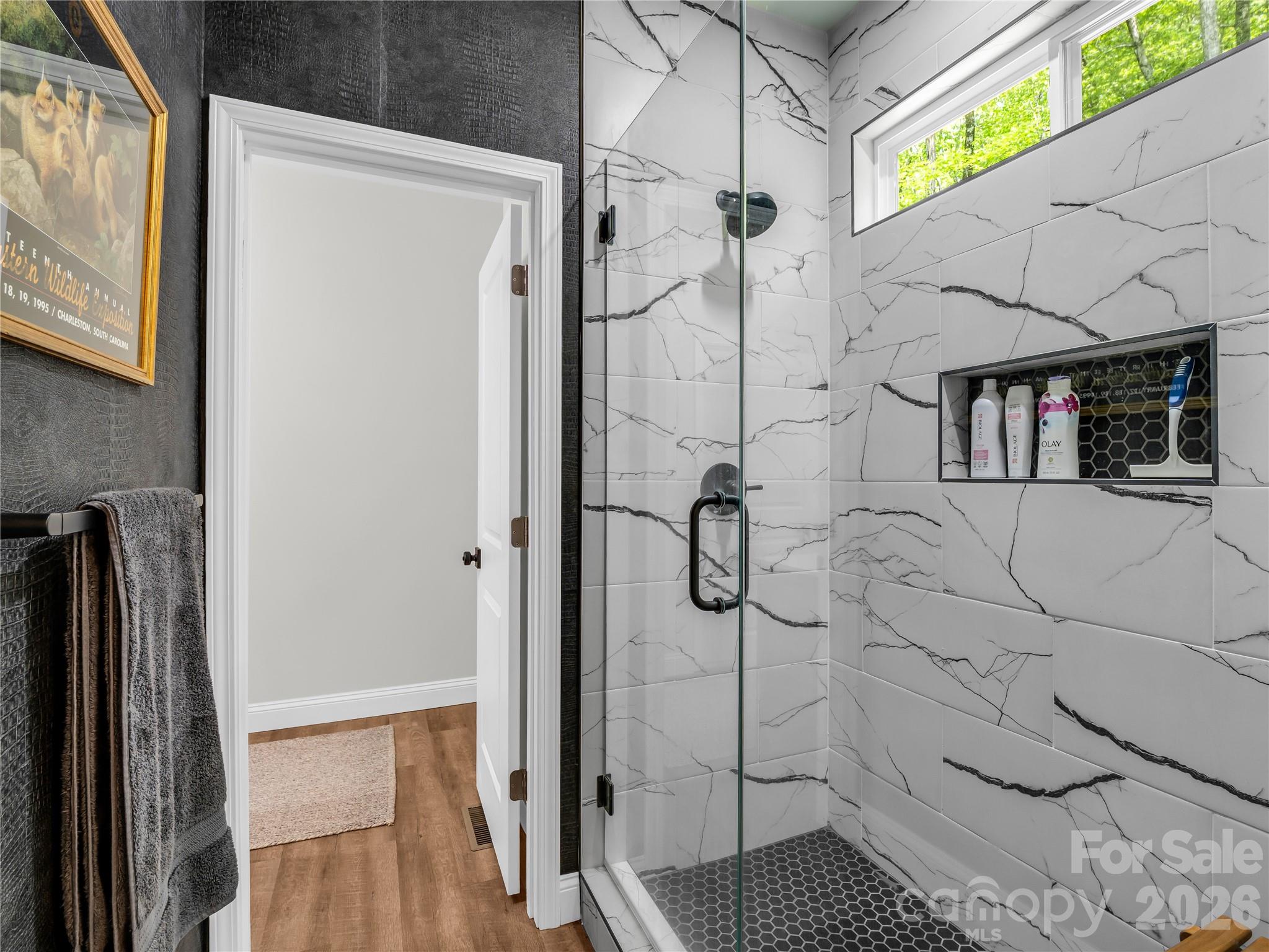 737 Melrose Mountain Road Tryon, NC 28782 - Photo 26 of 42 a bathroom with a shower