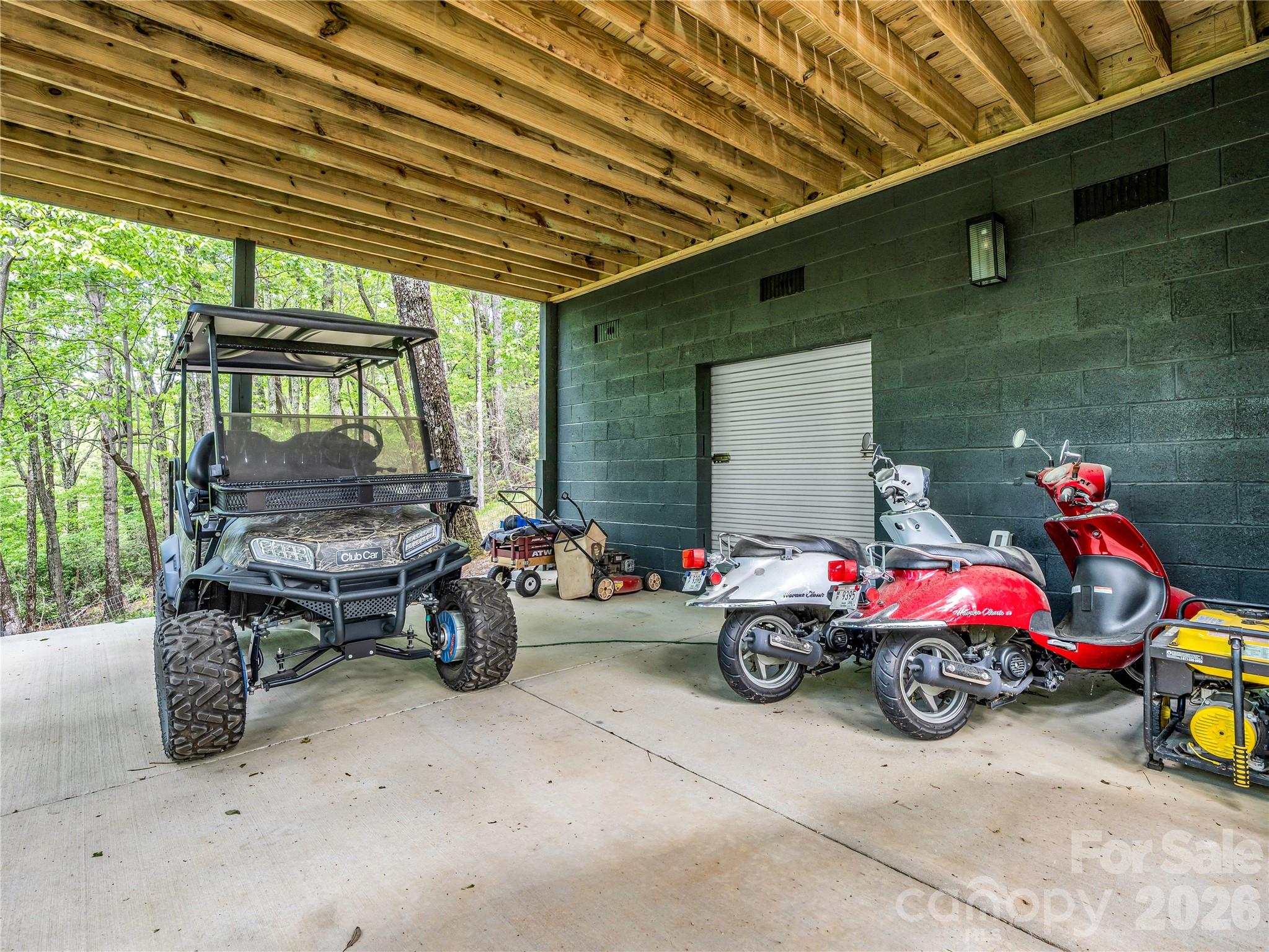 737 Melrose Mountain Road Tryon, NC 28782 - Photo 35 of 42 a car parked in garage