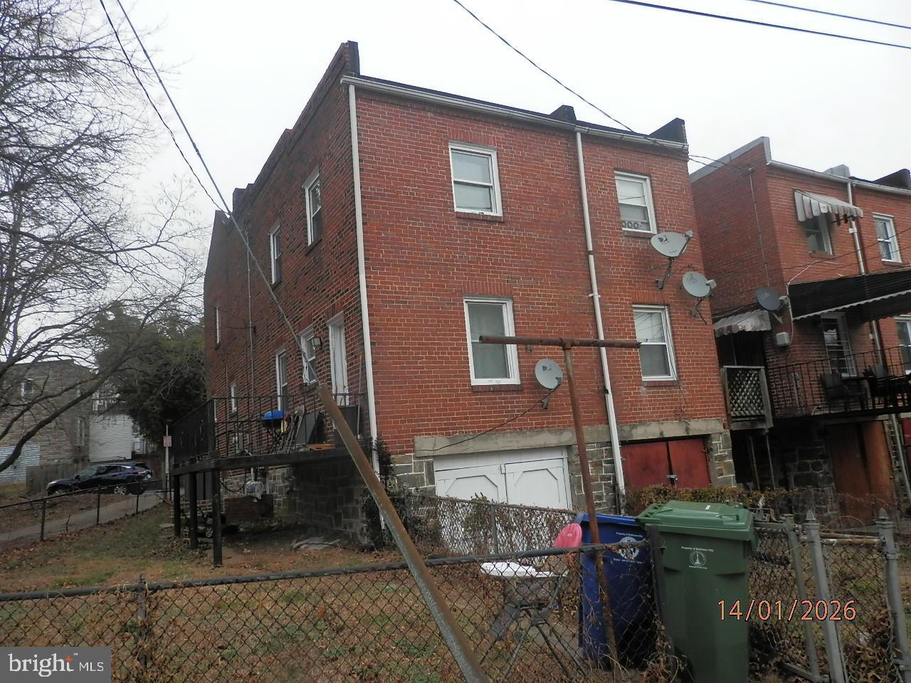 3327 Elbert Street Baltimore, MD 21229 - Photo 15 of 15 Back of house with garage.