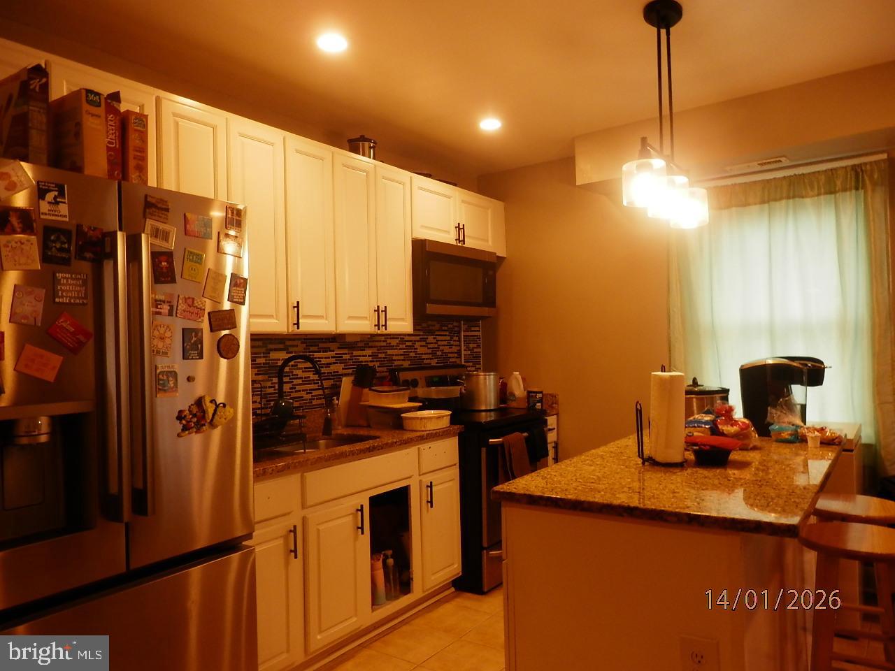 3327 Elbert Street Baltimore, MD 21229 - Photo 8 of 15 view of the kitchen with appliances