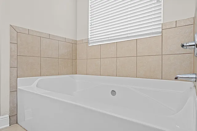 a bathroom with a bathtub