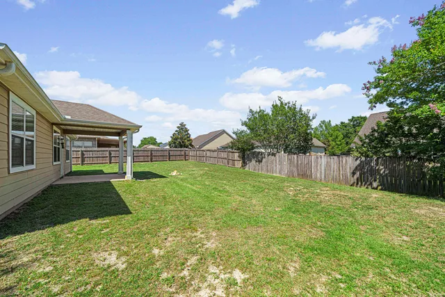 a view of a backyard with a garden
