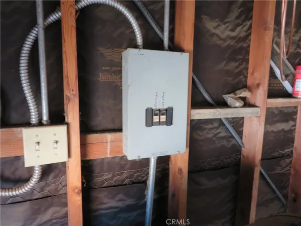 a room with gym equipment and a large window