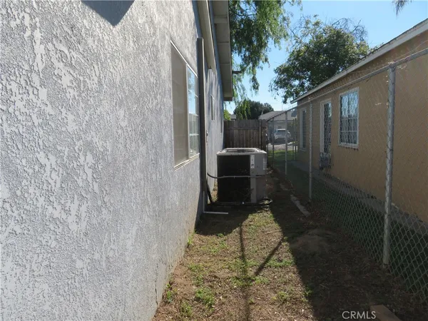 a backyard of a house with seating space