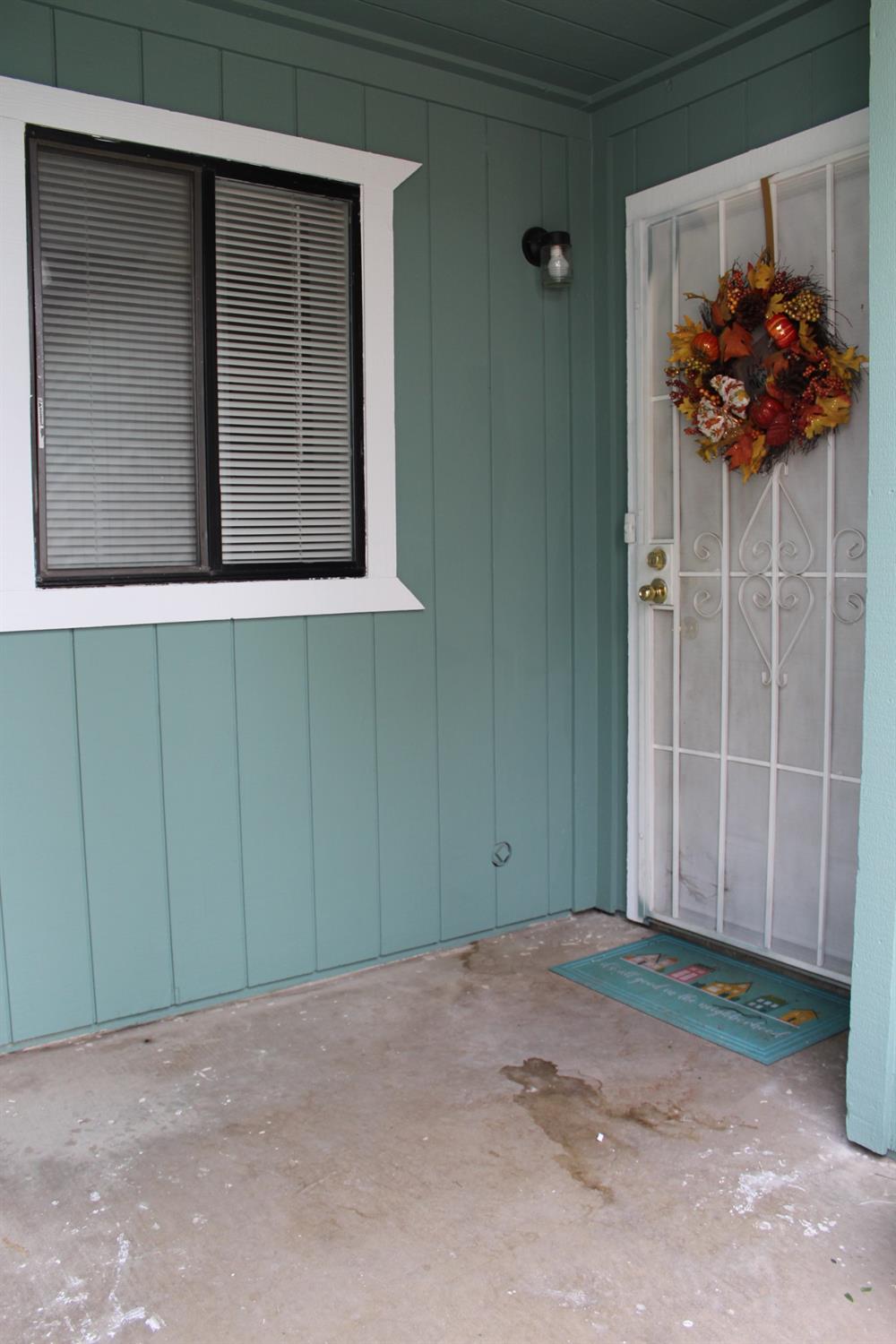 13431 South Henderson Road Caruthers, CA 93609 - Photo 2 of 14 a view of a house with a backyard