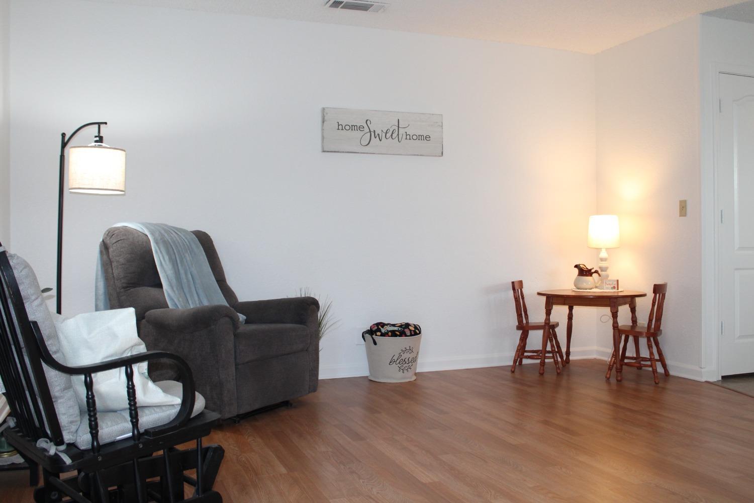 13431 South Henderson Road Caruthers, CA 93609 - Photo 4 of 14 a view of workspace room with furniture and wooden floor