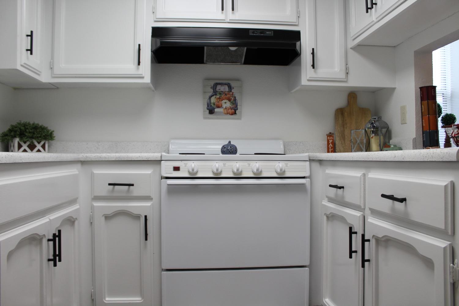 13431 South Henderson Road Caruthers, CA 93609 - Photo 8 of 14 a kitchen with a sink and cabinets