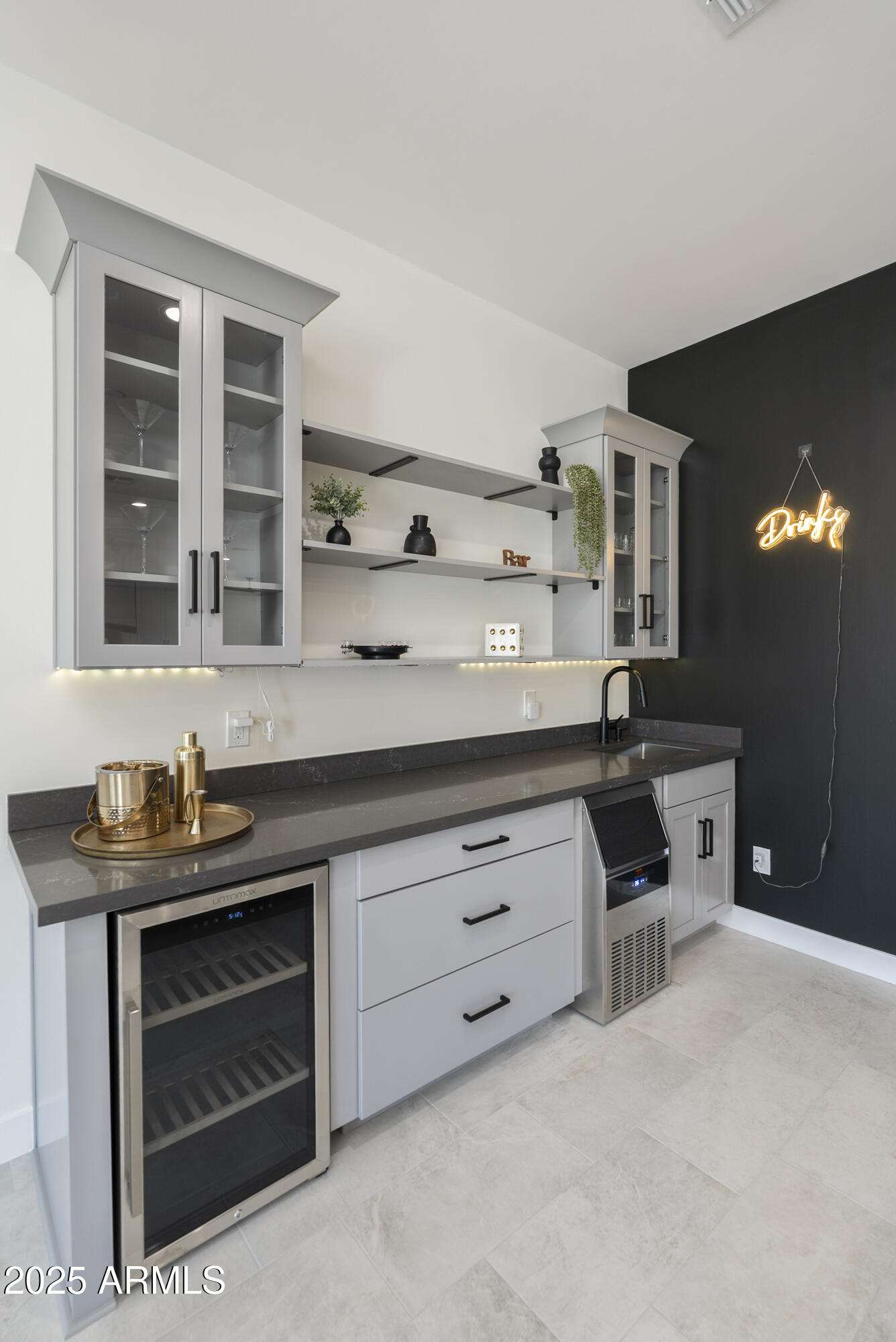 5049 East Shaw Butte Drive Scottsdale, AZ 85254 - Photo 31 of 88 a kitchen with granite countertop cabinets stove and sink