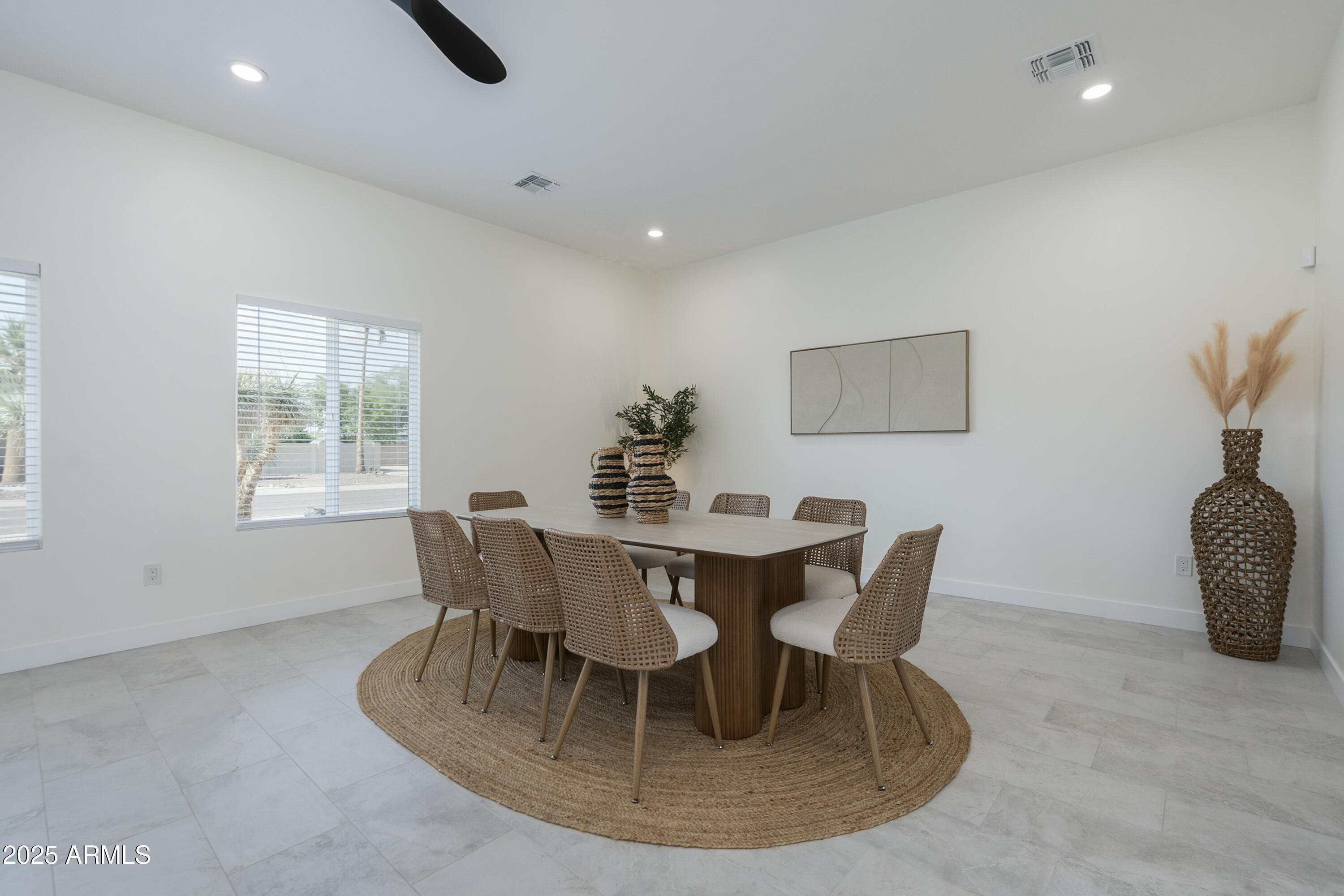 5049 East Shaw Butte Drive Scottsdale, AZ 85254 - Photo 33 of 88 a dining room with furniture and window