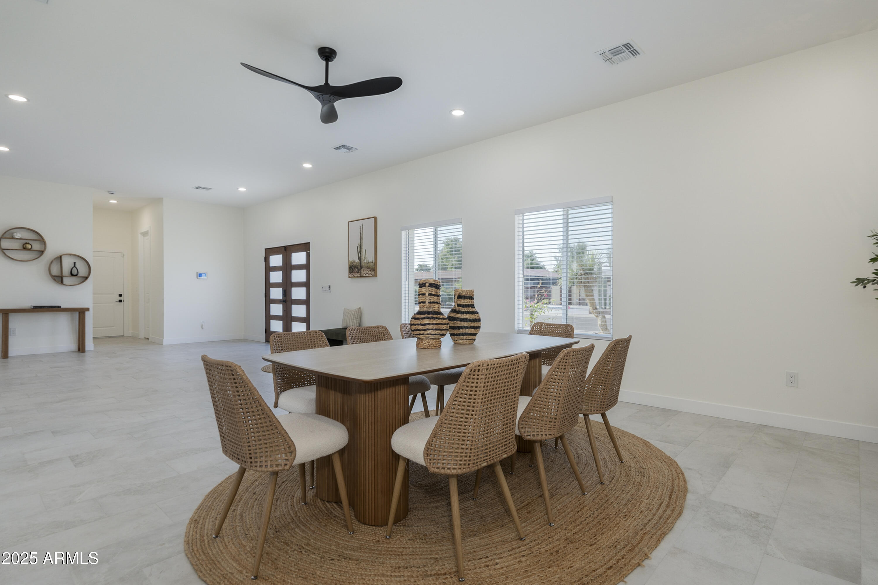 5049 East Shaw Butte Drive Scottsdale, AZ 85254 - Photo 34 of 88 a view of a dining room with furniture