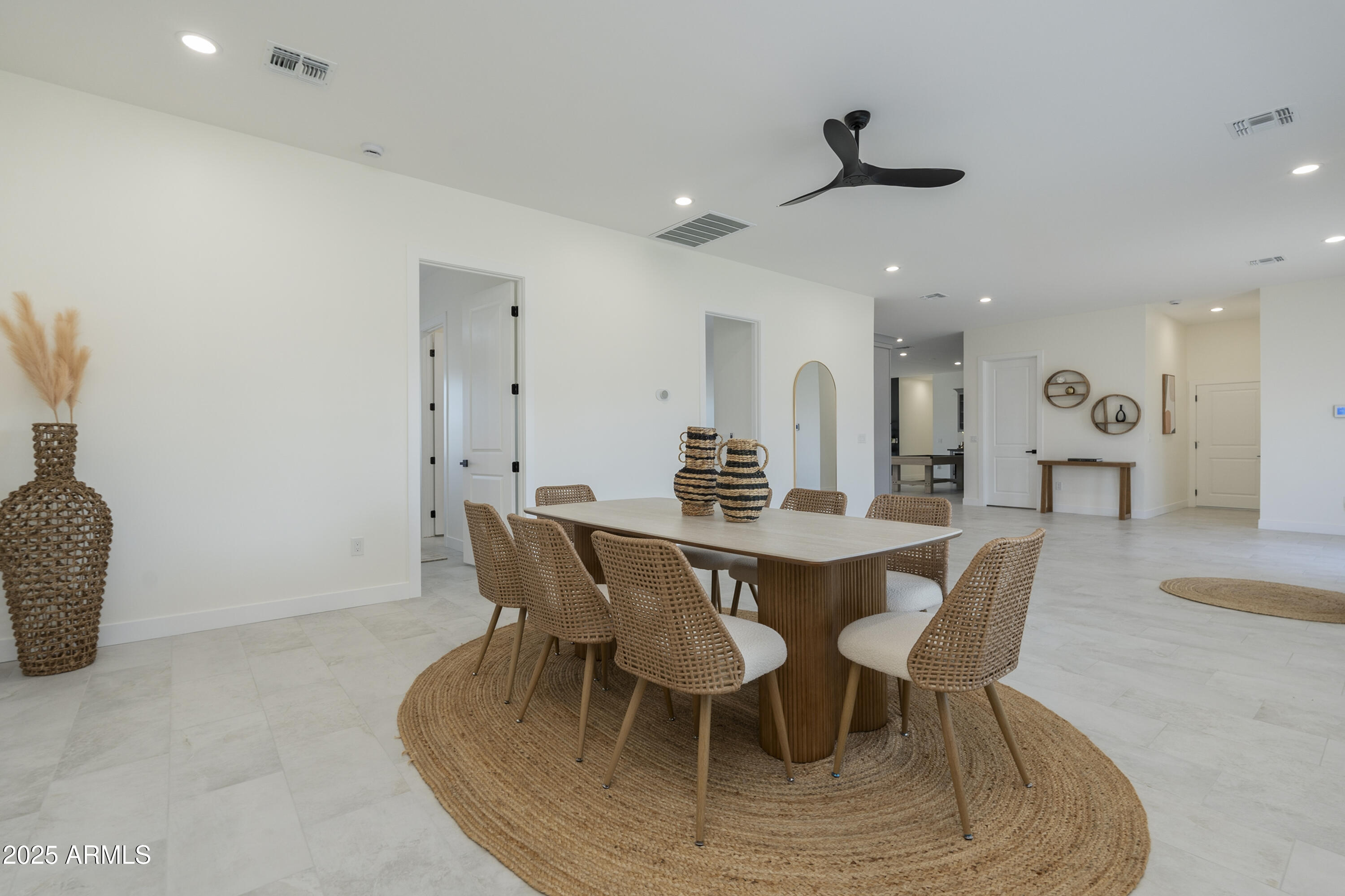 5049 East Shaw Butte Drive Scottsdale, AZ 85254 - Photo 35 of 88 a view of a dining room with furniture