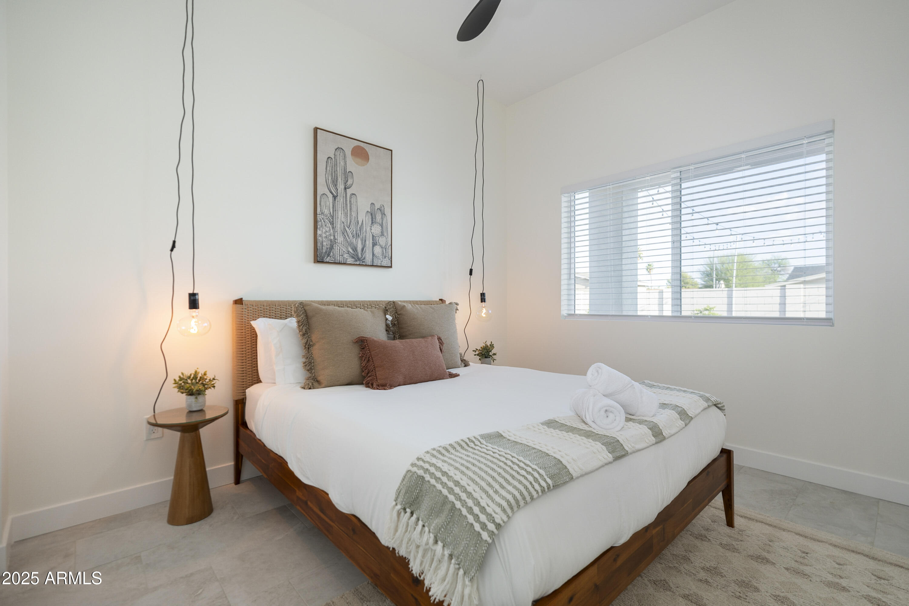 5049 East Shaw Butte Drive Scottsdale, AZ 85254 - Photo 64 of 88 a bedroom with a bed and a window