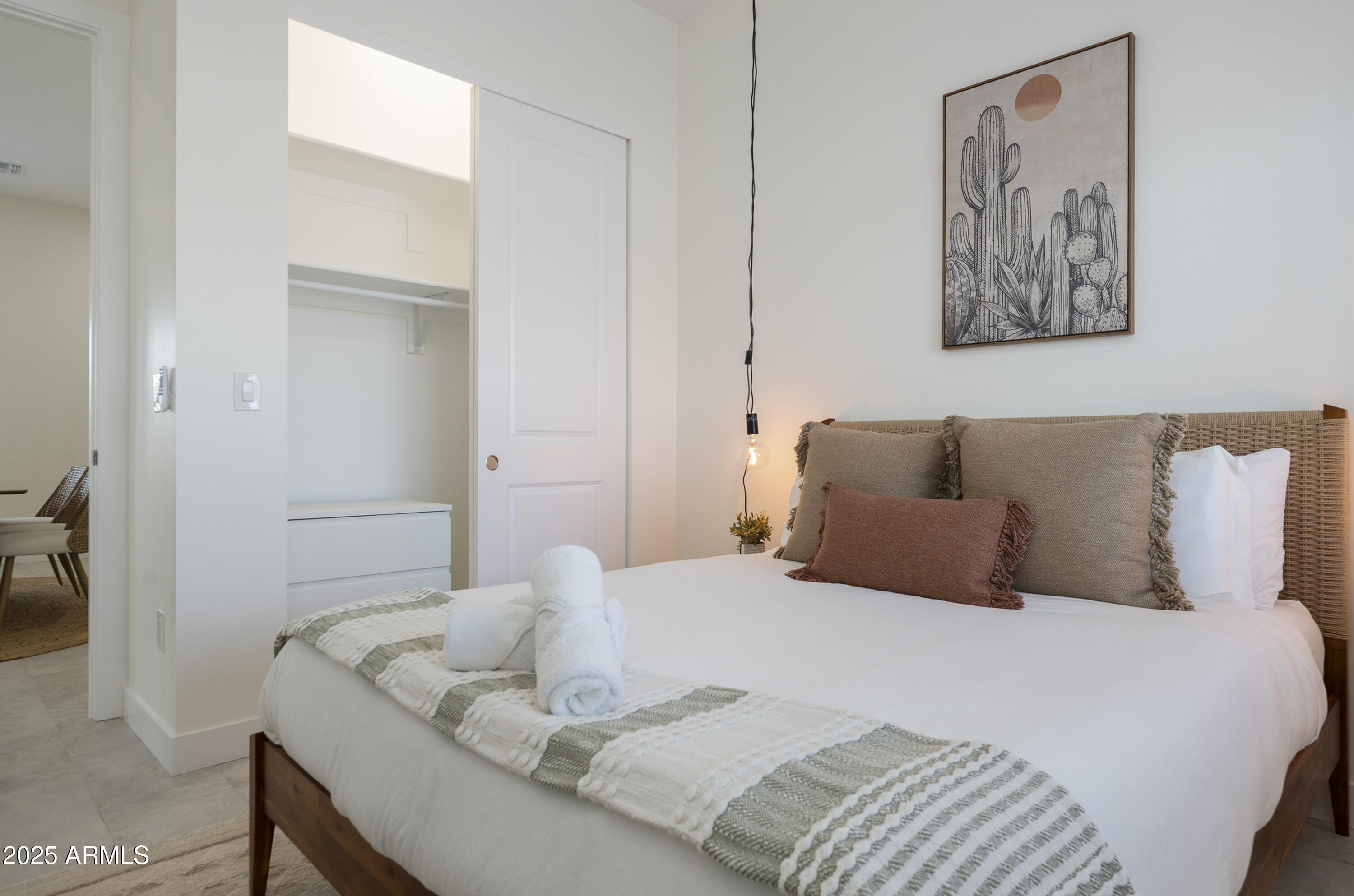 5049 East Shaw Butte Drive Scottsdale, AZ 85254 - Photo 7 of 88 a bedroom with a bed and painting on the wall