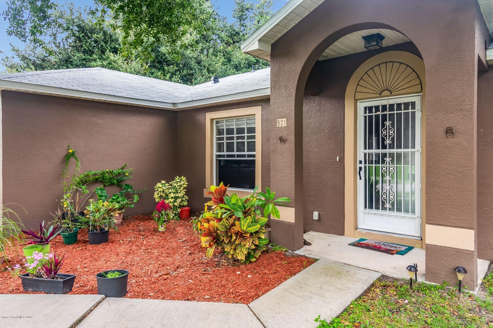 521 Koutnik Road Southeast Palm Bay, FL 32909 - Photo 3 of 26 26