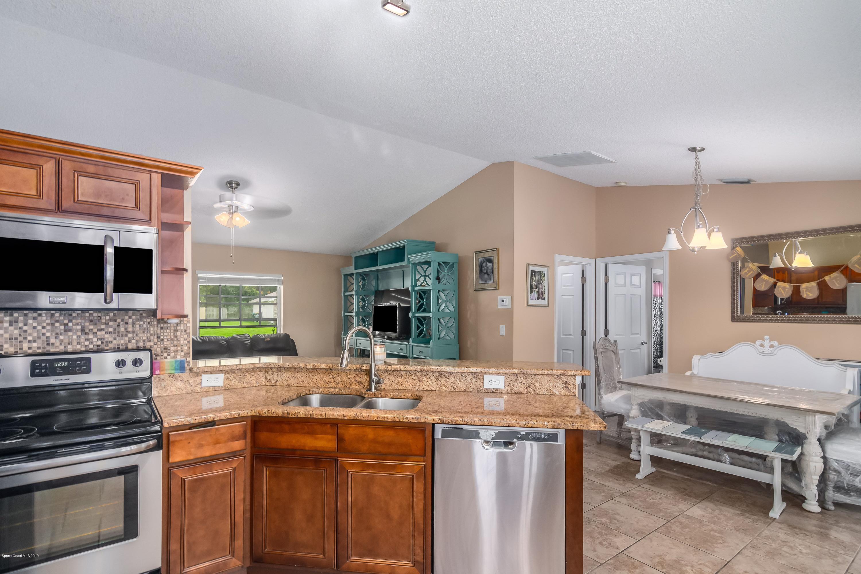 521 Koutnik Road Southeast Palm Bay, FL 32909 - Photo 4 of 26 11