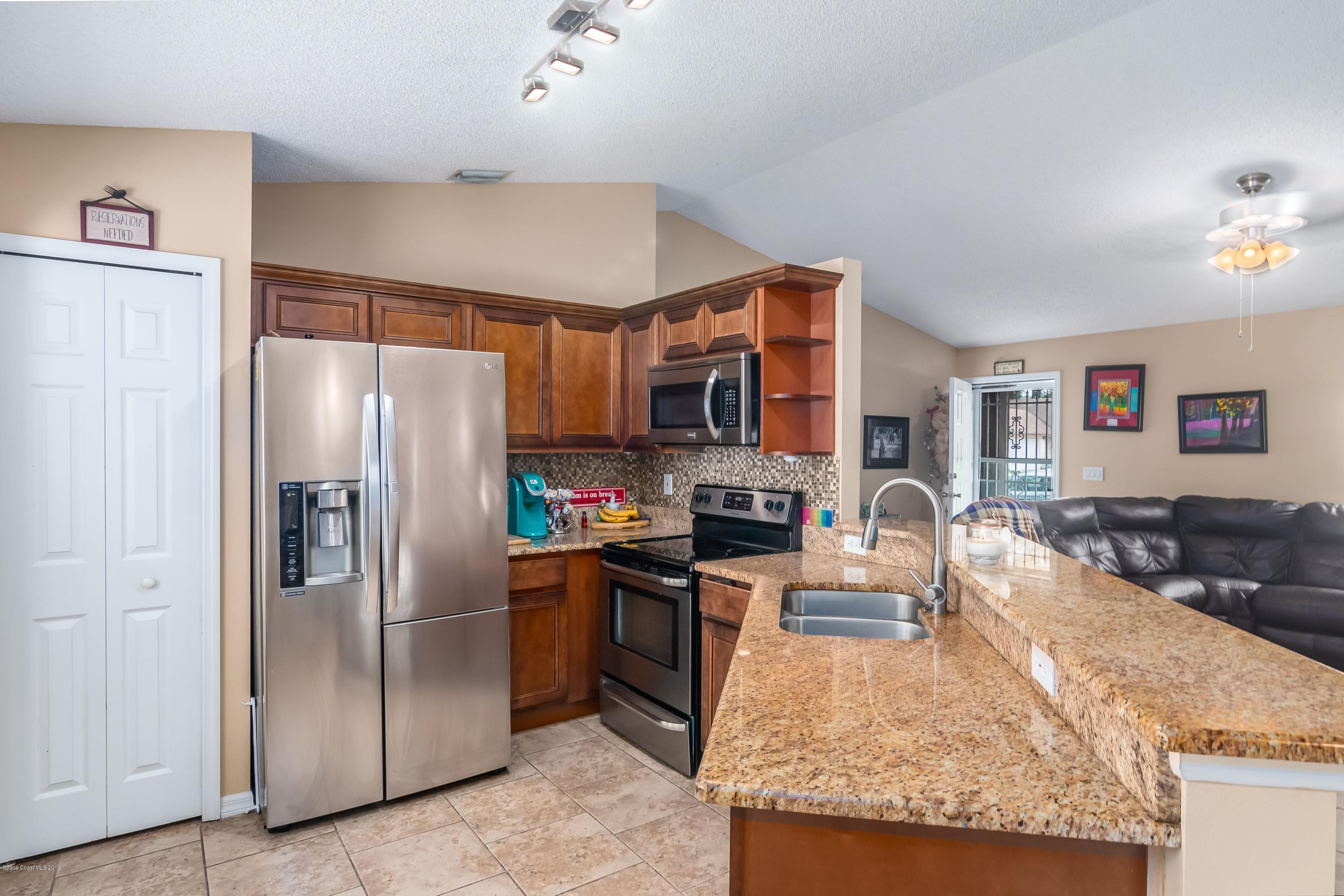 521 Koutnik Road Southeast Palm Bay, FL 32909 - Photo 5 of 26 9
