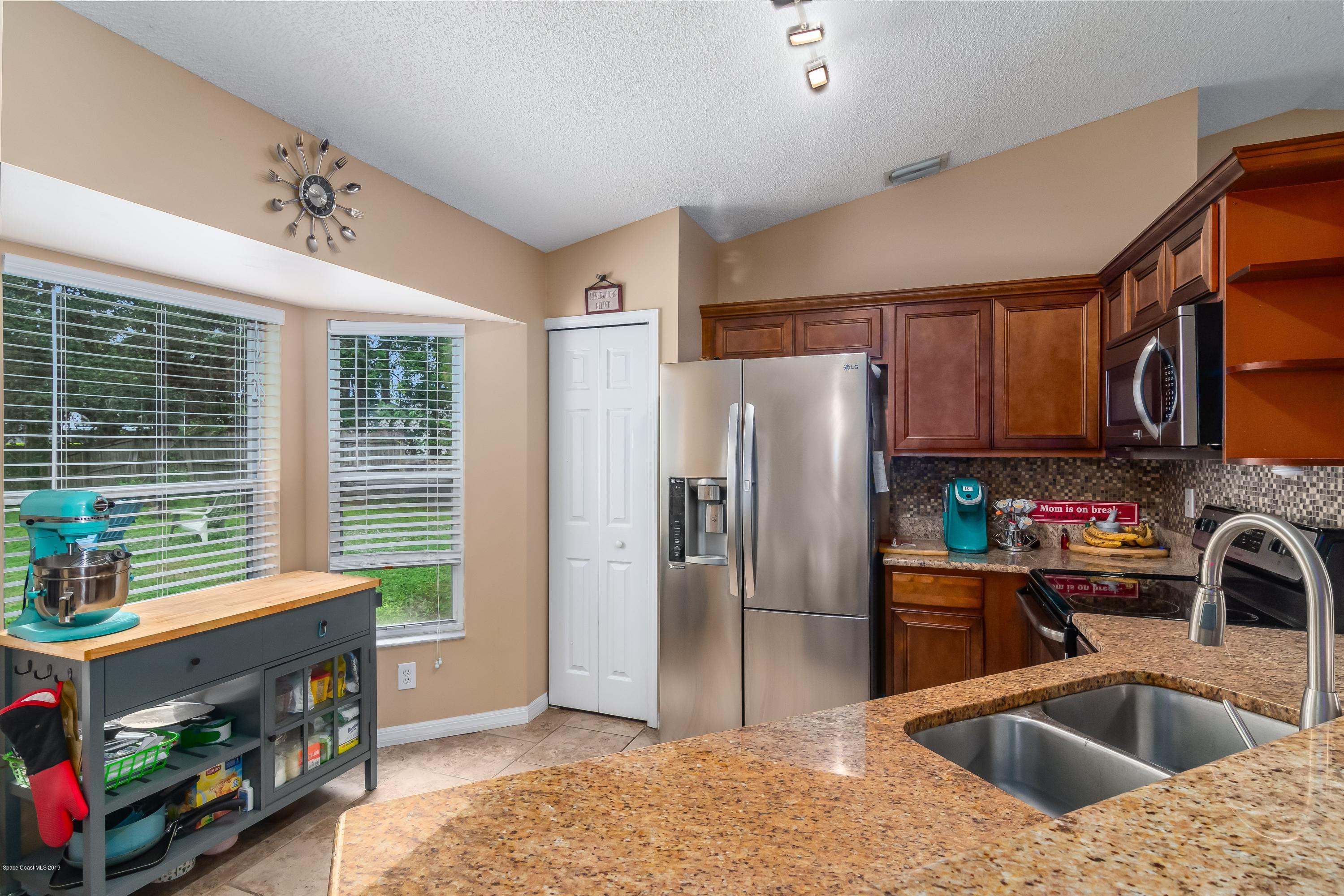 521 Koutnik Road Southeast Palm Bay, FL 32909 - Photo 7 of 26 10